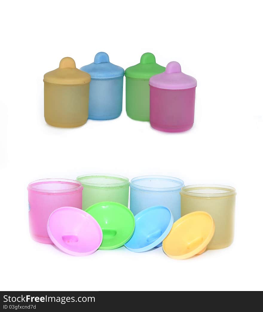 Colorful containers for food storage in home kitchen.