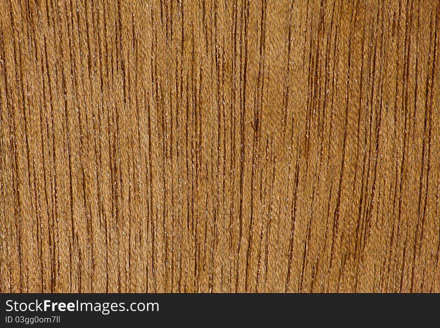 Brown plywood bckground texture stried in vertical. Brown plywood bckground texture stried in vertical