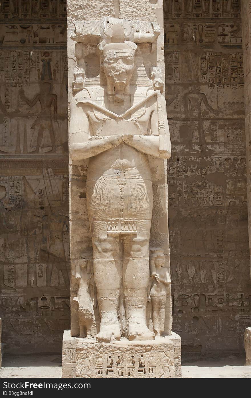 Statue of a pharaoh at the temple of Medinat Habu in Luxor. Statue of a pharaoh at the temple of Medinat Habu in Luxor