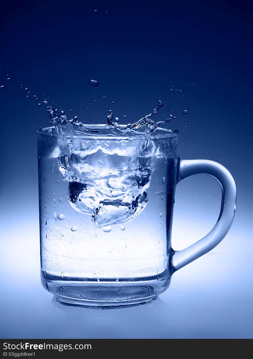 Water is poured into a glass. Water is poured into a glass