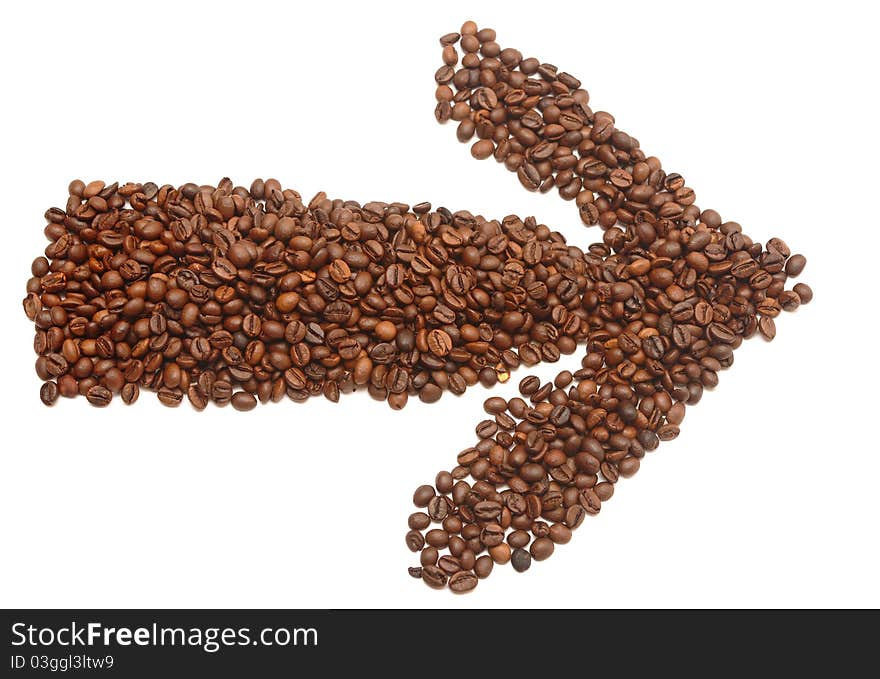 An arrow made of coffee beans