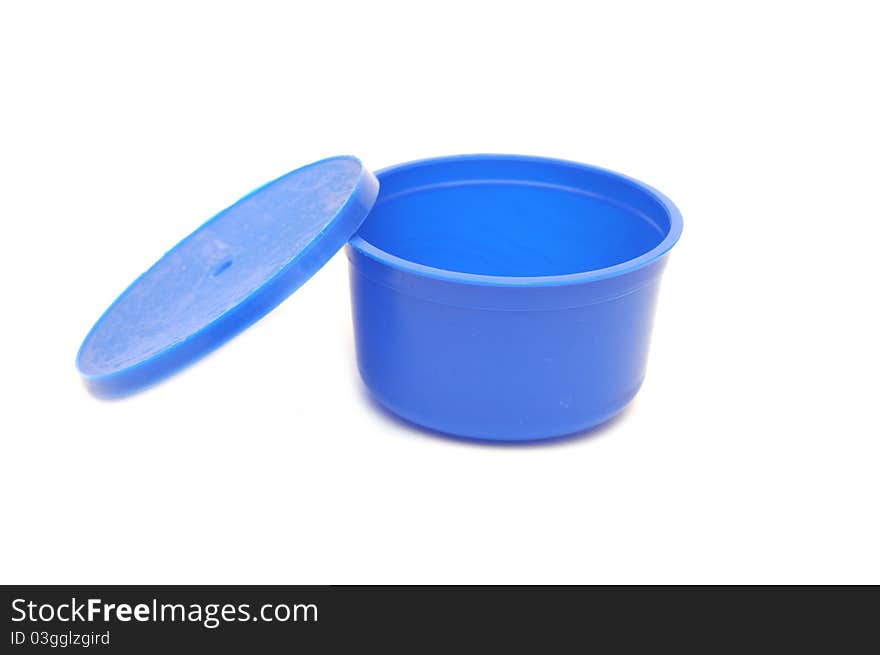 Blue plastic can on white