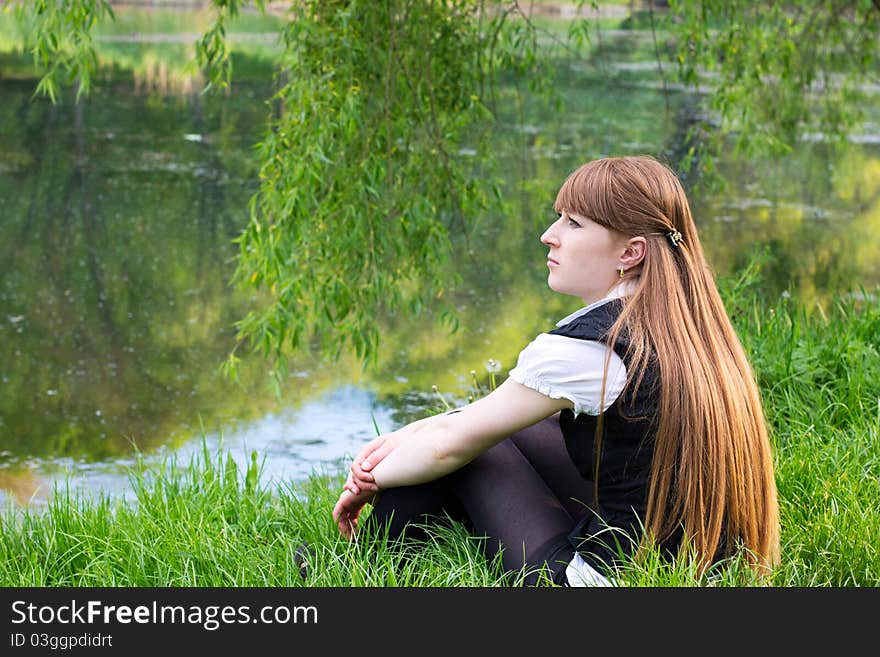 Beautiful Woman Relaxing At The Park