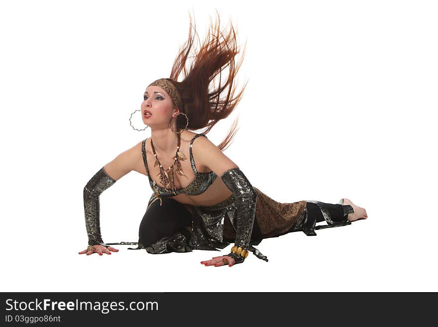 Woman in a snake costume dance in a tribal style. Woman in a snake costume dance in a tribal style