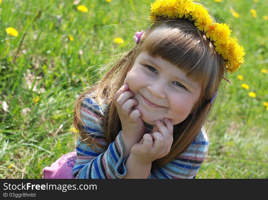 Spring sunny day. Little girl playing outdoors. Spring sunny day. Little girl playing outdoors