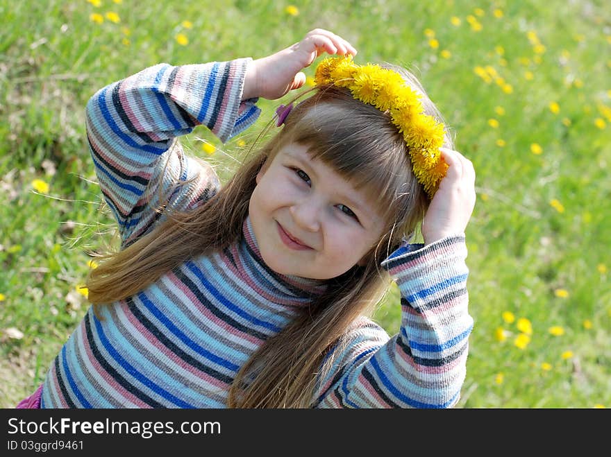 Llittle girl in a flower wreath