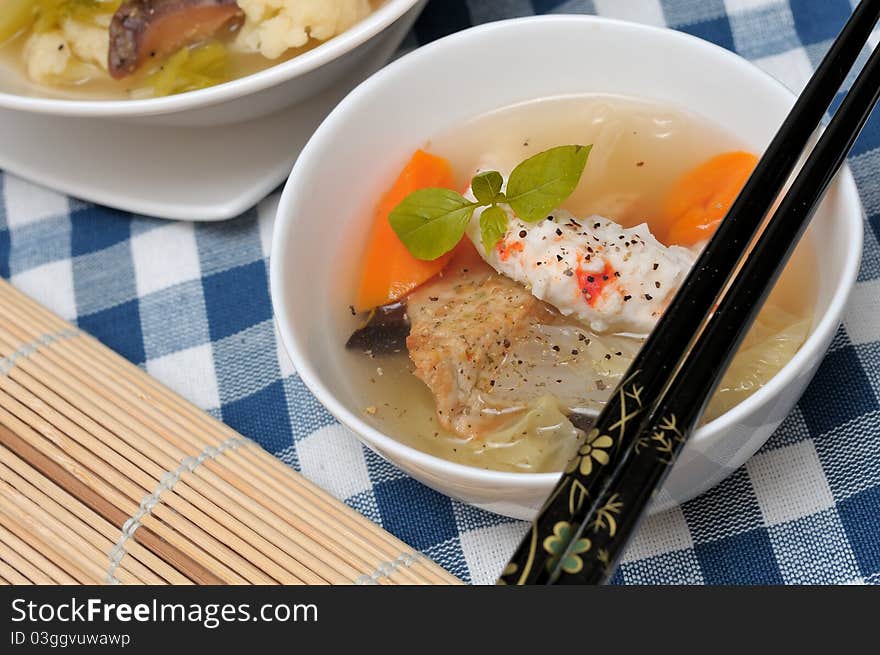 Japanese or Oriental style vegetarian seafood soup with healthy vegetables and prawn. Japanese or Oriental style vegetarian seafood soup with healthy vegetables and prawn.