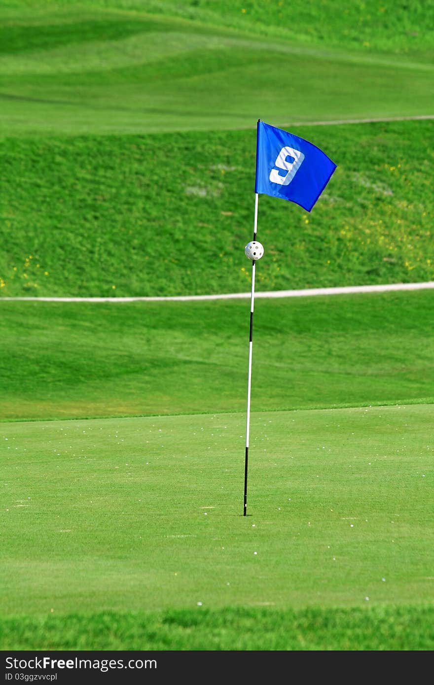 9th flag on the golf course. 9th flag on the golf course