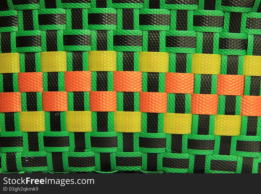 Texture of colorful weaved basket pattern. Texture of colorful weaved basket pattern