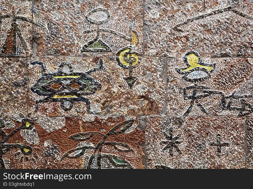 Ancient ba pictograph of the naxi people (a minority ethnic group) as decoration on the wall, lijiang, yunnan, china. Ancient ba pictograph of the naxi people (a minority ethnic group) as decoration on the wall, lijiang, yunnan, china.