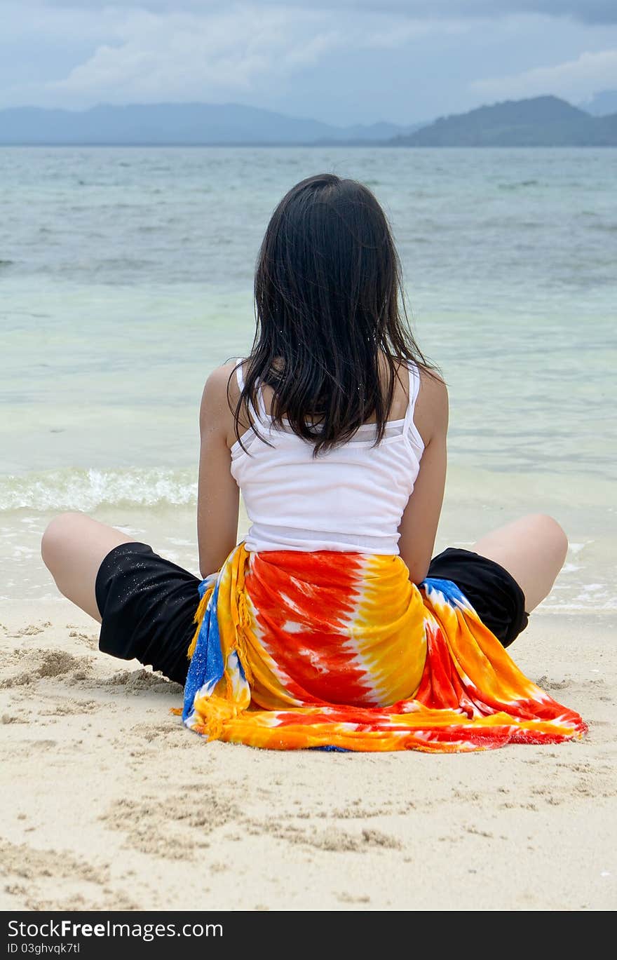 Young pretty girl rest at beach