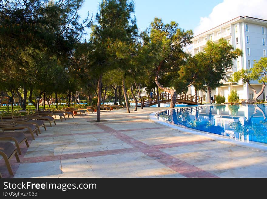 Pool in the open air against high mountains. Pool in the open air against high mountains