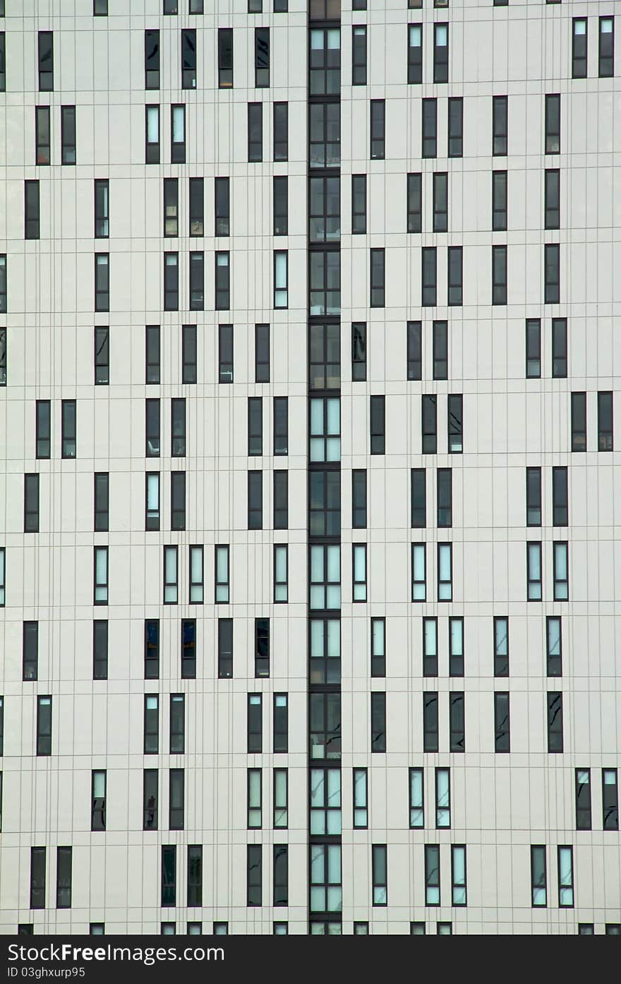 Small windows in a modern apartment block. Small windows in a modern apartment block.