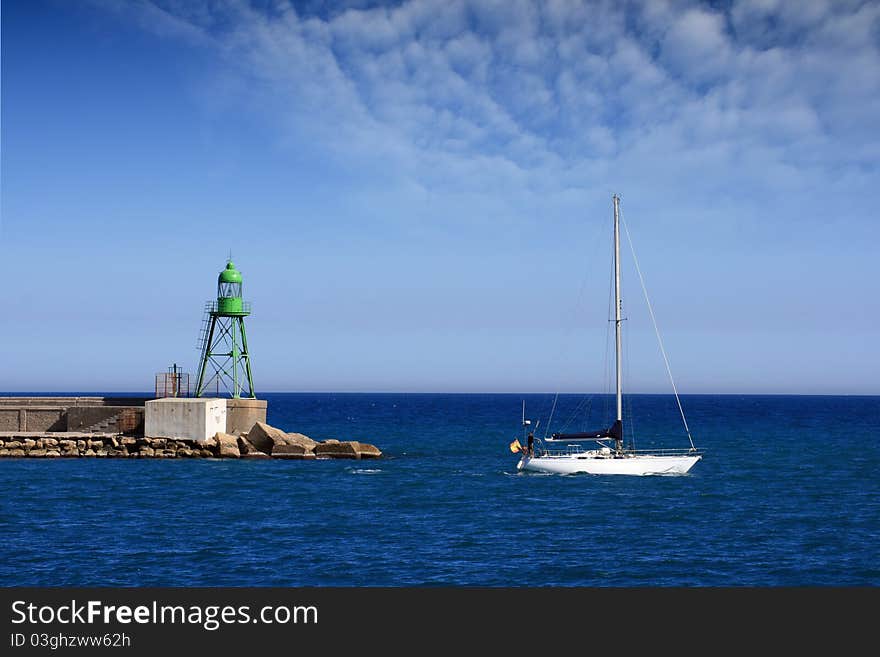 Sailing boat starting the travel