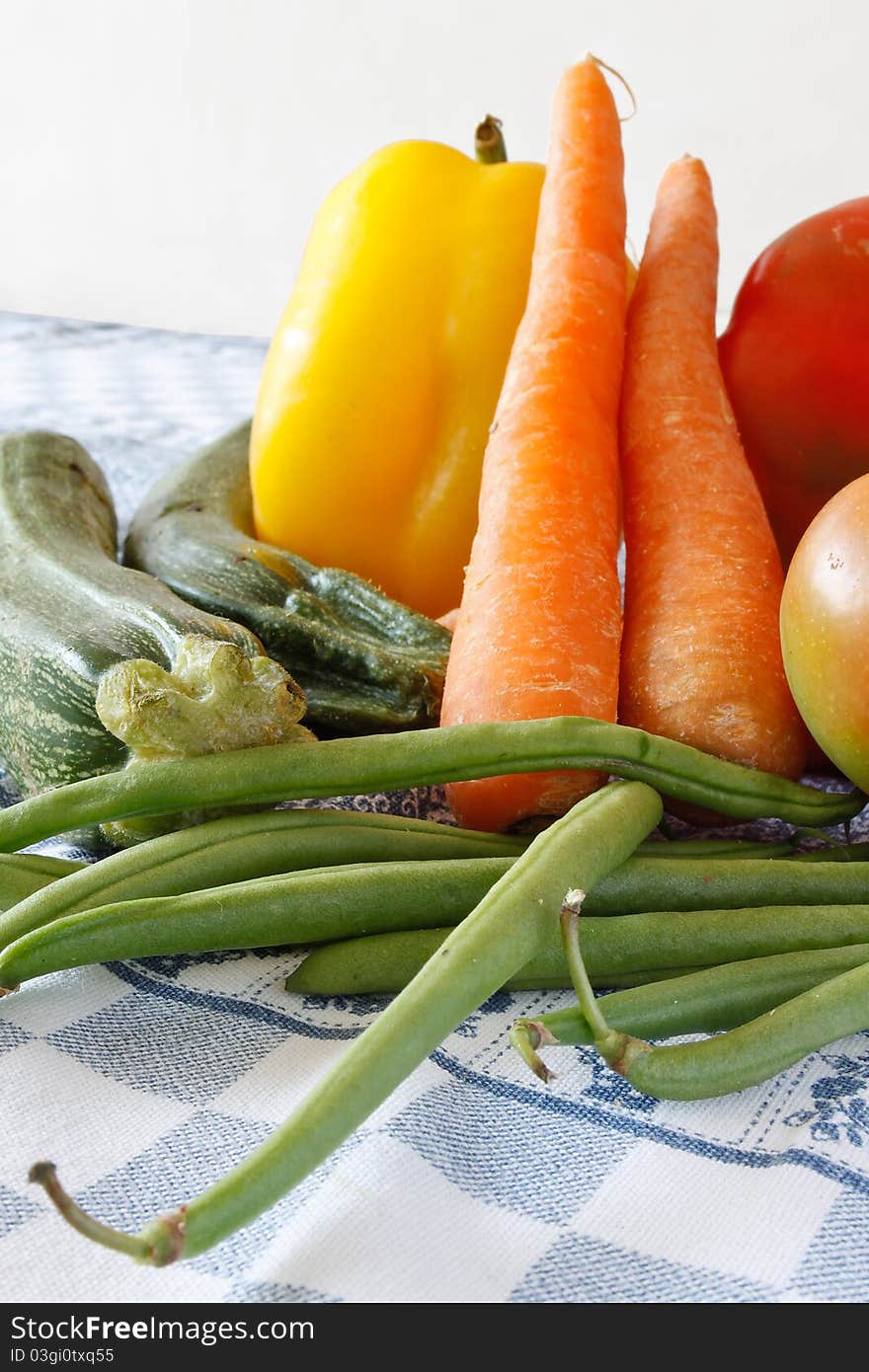 Closeup of raw vegetables on the tablecloth