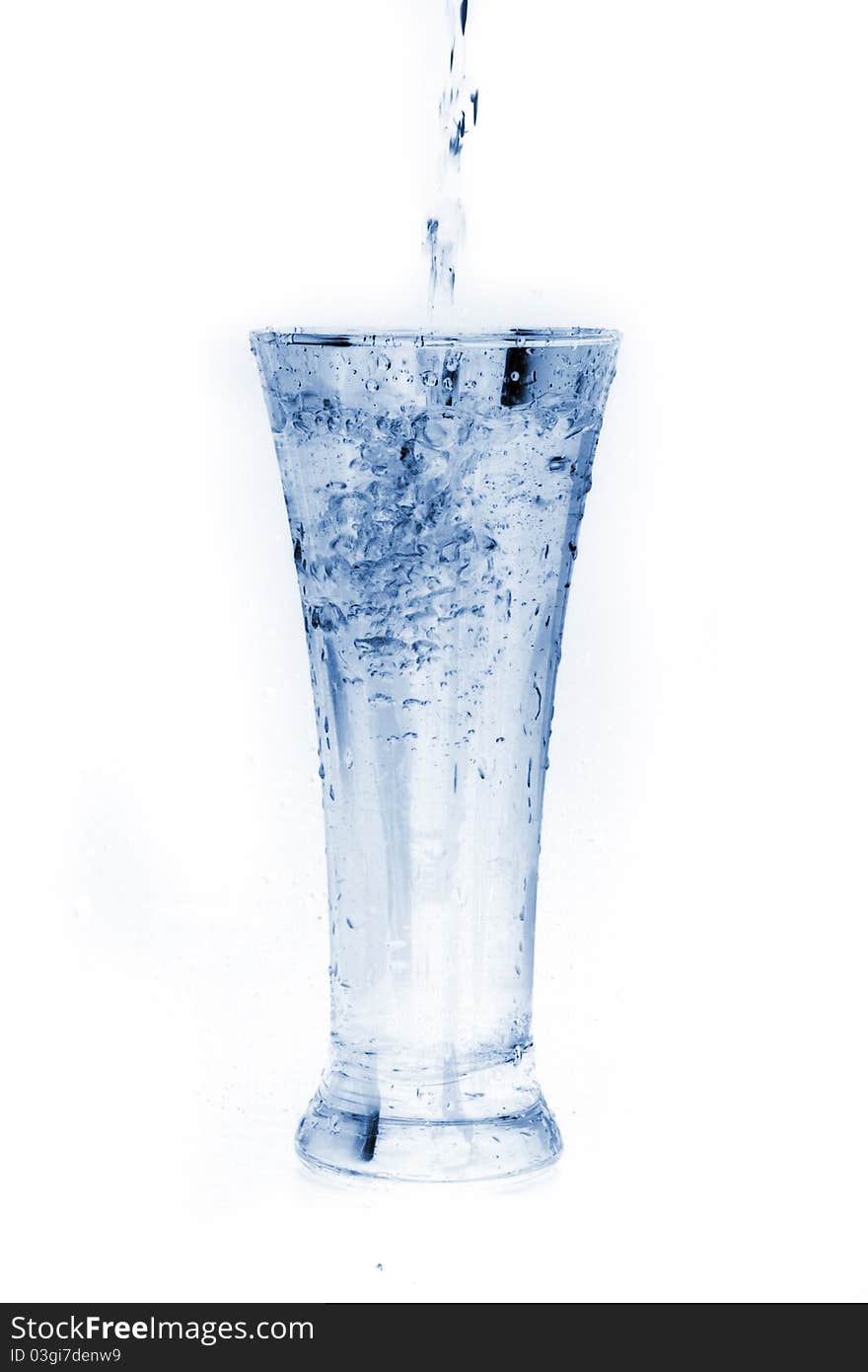 Glass of water on white