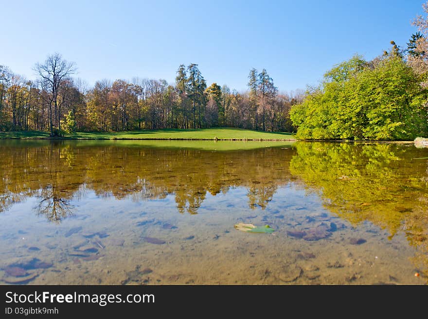 Beautiful pond in the autumn park