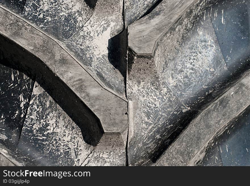 Close-up of a new tractor's rubber tyre. Close-up of a new tractor's rubber tyre.