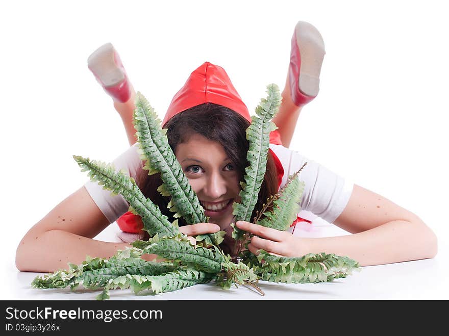 Full-length portrait of lying Red Riding Hood isolated on a white