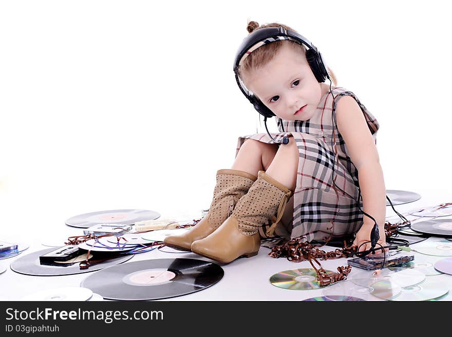 Babe playing with tapes and music records. Babe playing with tapes and music records