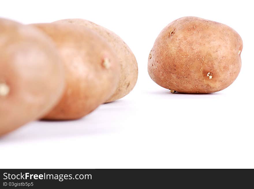 Fresh potato on a white background