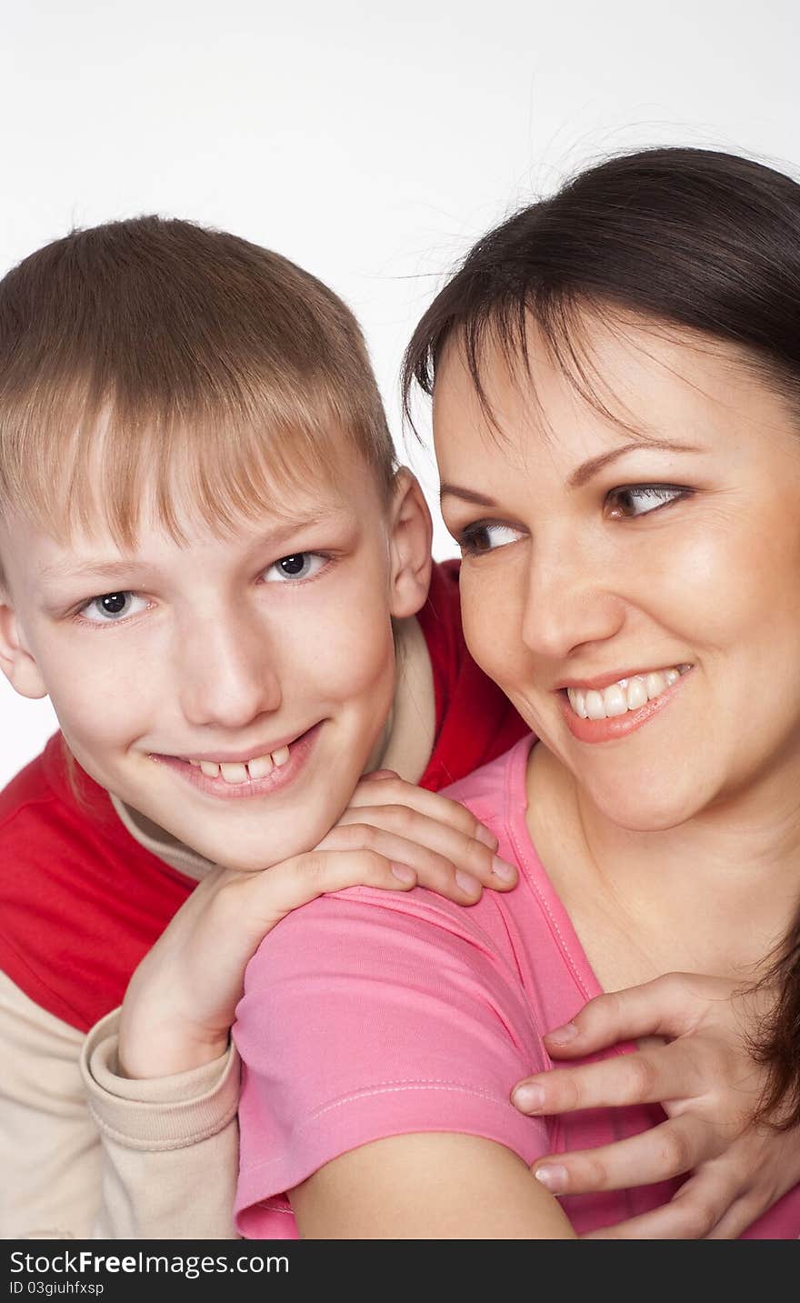 Mom with her son on a white background. Mom with her son on a white background