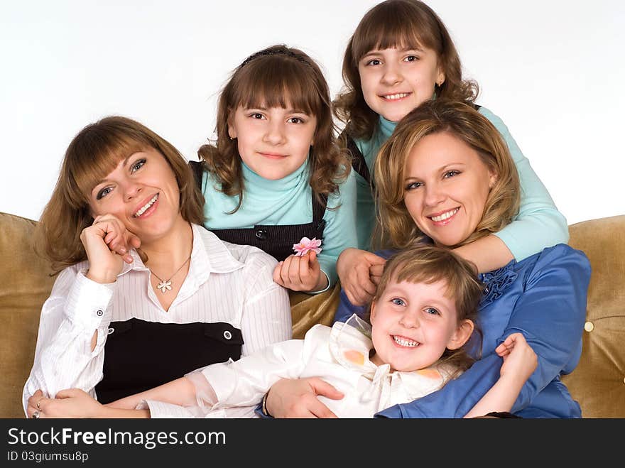 Funny relatives sitting on sofa on a white background. Funny relatives sitting on sofa on a white background