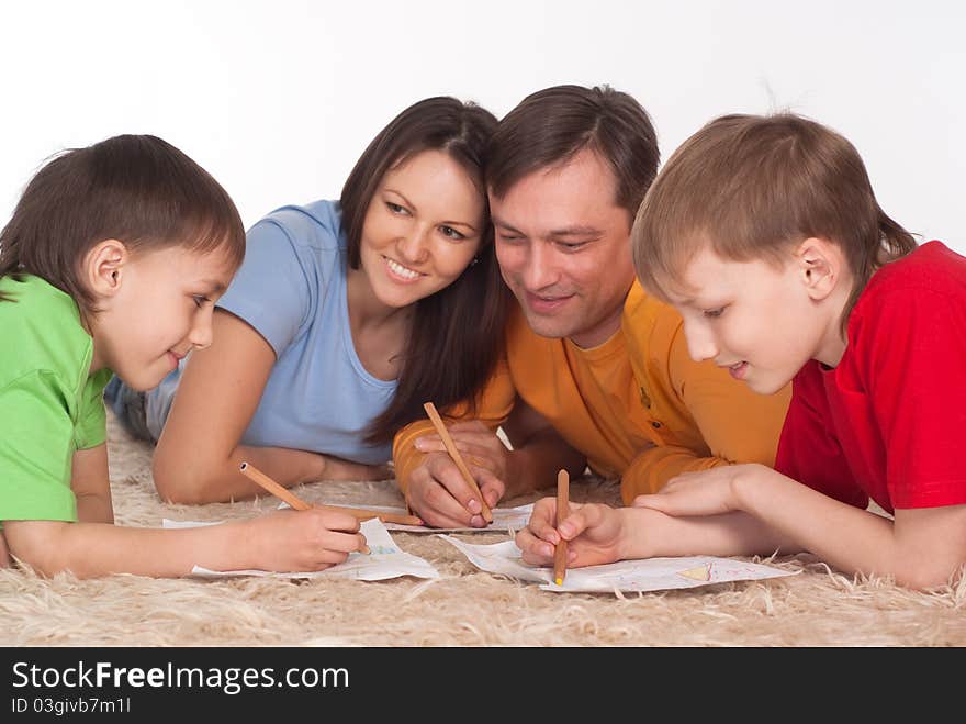 Nice family drawing on a carpet on white