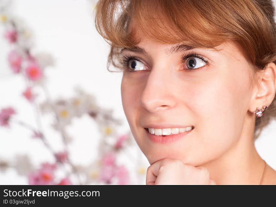 Face of a nice girl with flowers. Face of a nice girl with flowers