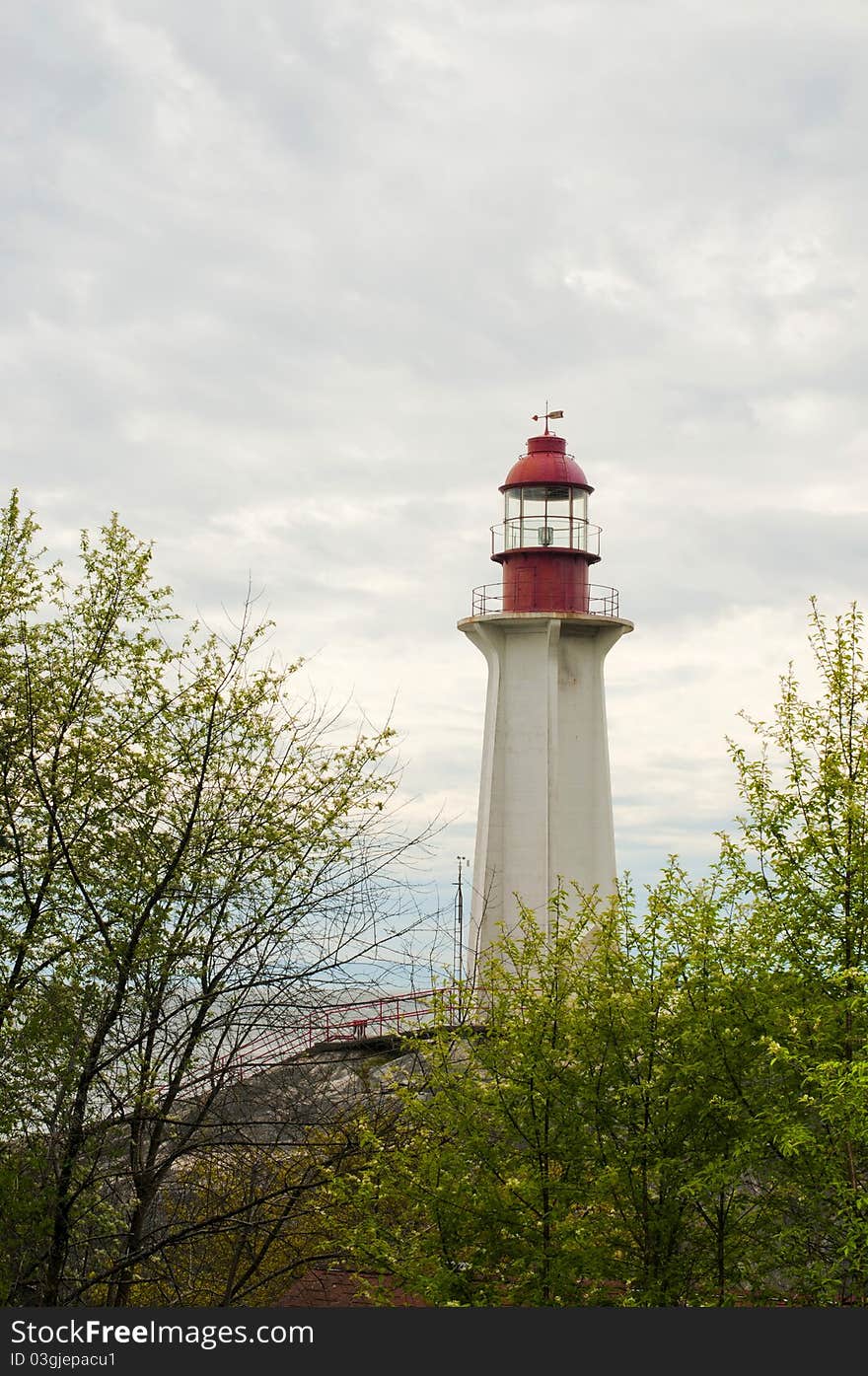 Lighthouse with trees at the front