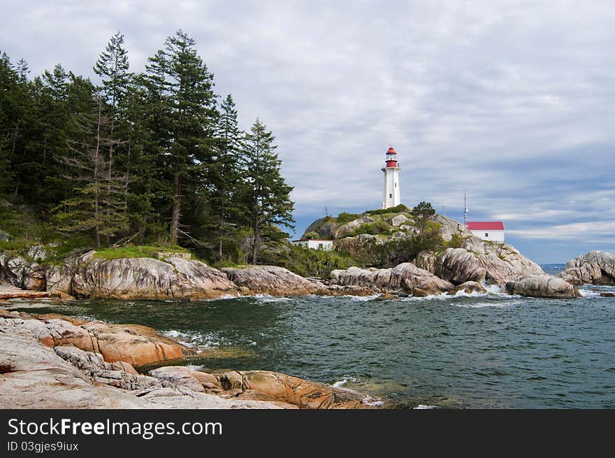 Lighthouse with cloudy sky