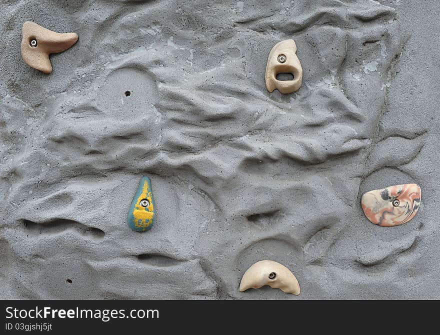 Detail of a climbing wall in a sports facility.