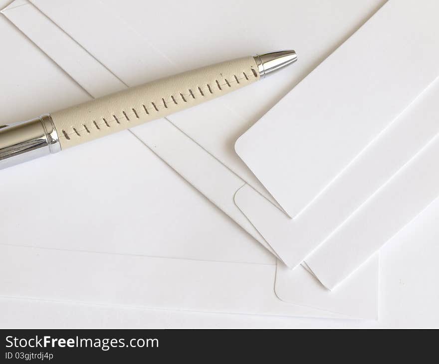 Blank envelops with interesting pen, business concept. Blank envelops with interesting pen, business concept