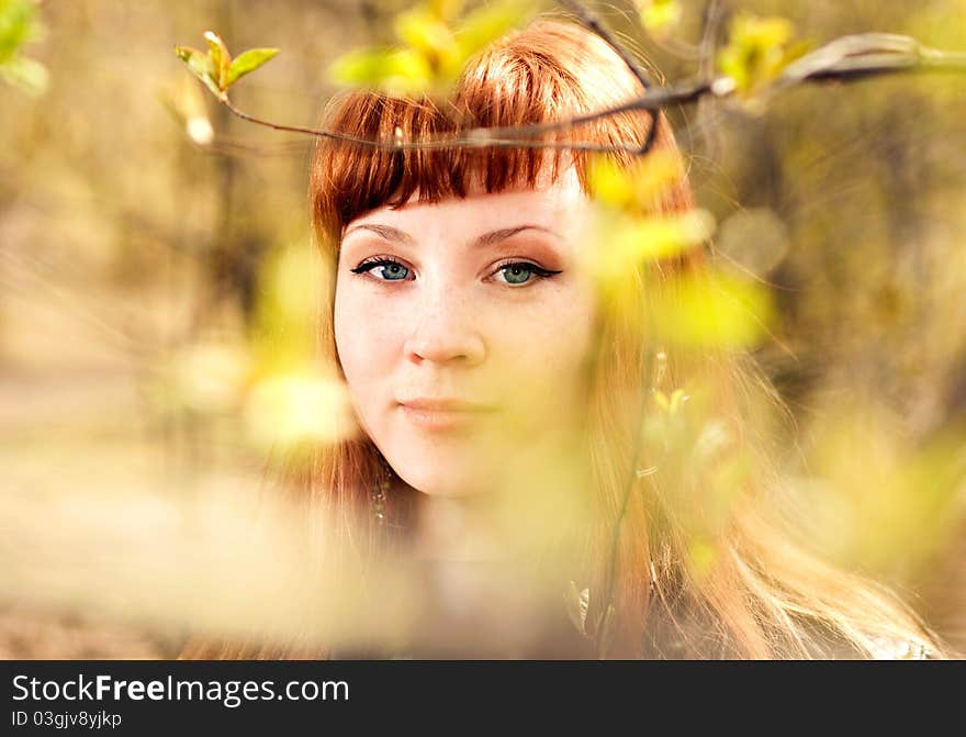 A portrait of a young beautiful woman outdoor