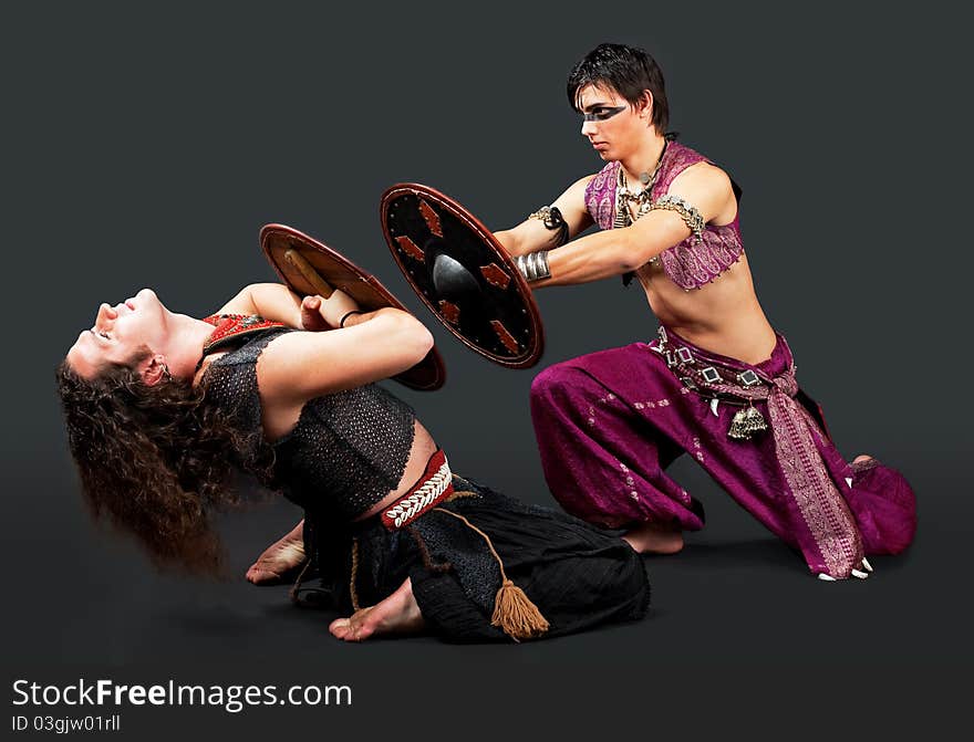 Ritual scene with shield and spear - traditional arabia costume. Ritual scene with shield and spear - traditional arabia costume