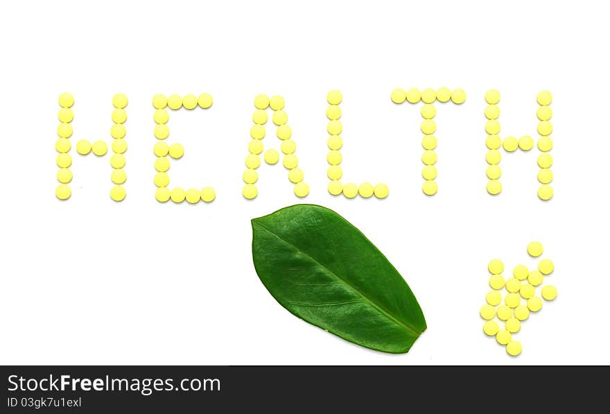 Word HEALTH Made From Yellow Medication Pills