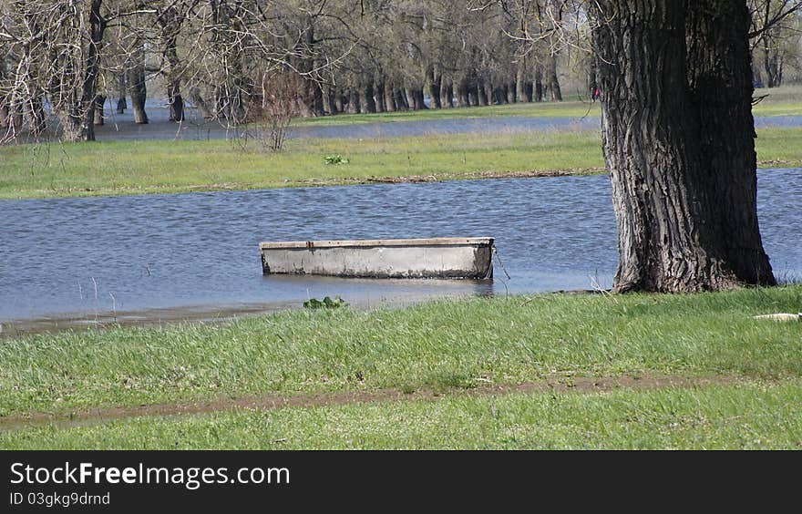 Background. The thrown boat adhered by a chain