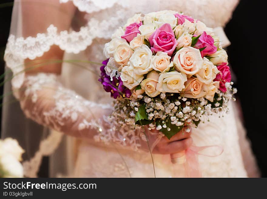 Wedding bouquet in hands of the girl