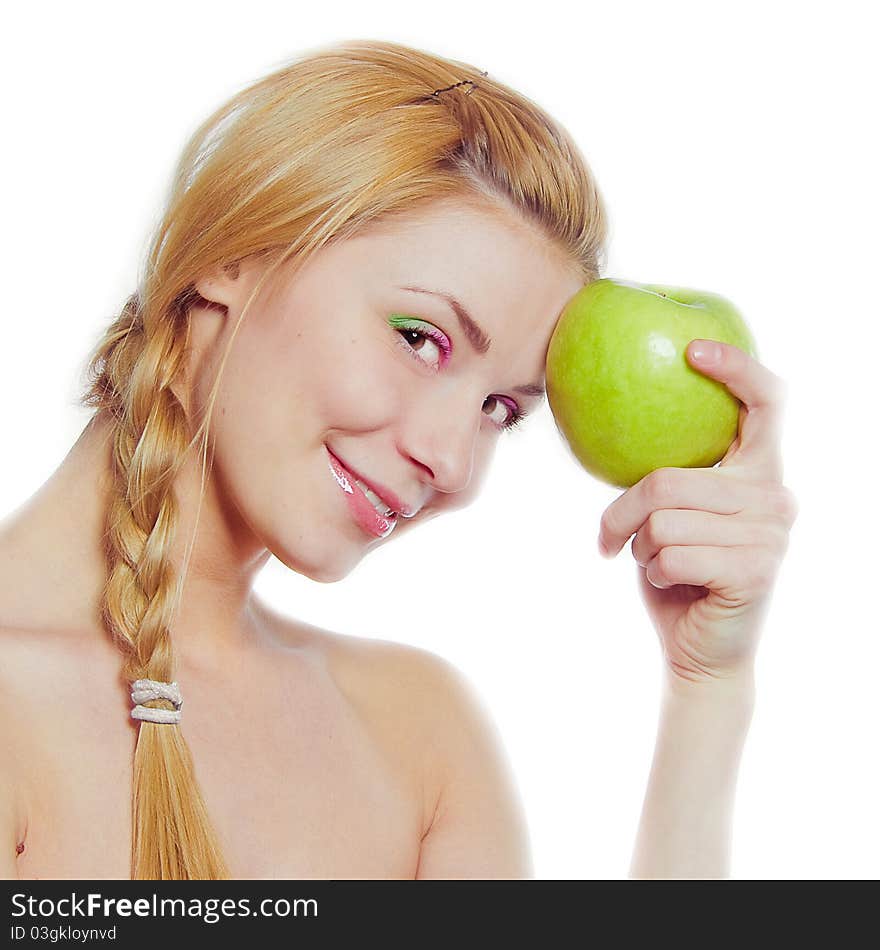 Portrait of young woman with green apple