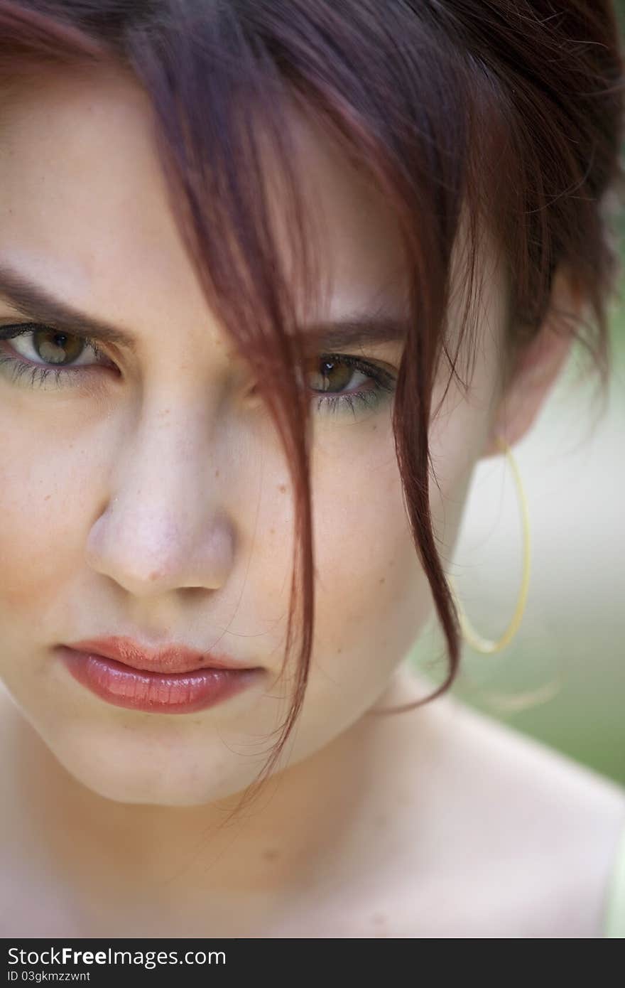 Close-up portrait of young female face. Close-up portrait of young female face