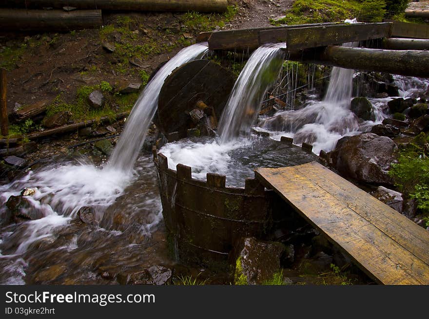 River water flows through the wooden channels. River water flows through the wooden channels.