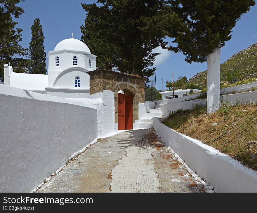 The first impression of Archangelos - or Arhangelos - is unlikely to be very positive, as it gives you the feeling of any Greek provincial town - a concrete wasteland with noisy cafés and nowhere to park.