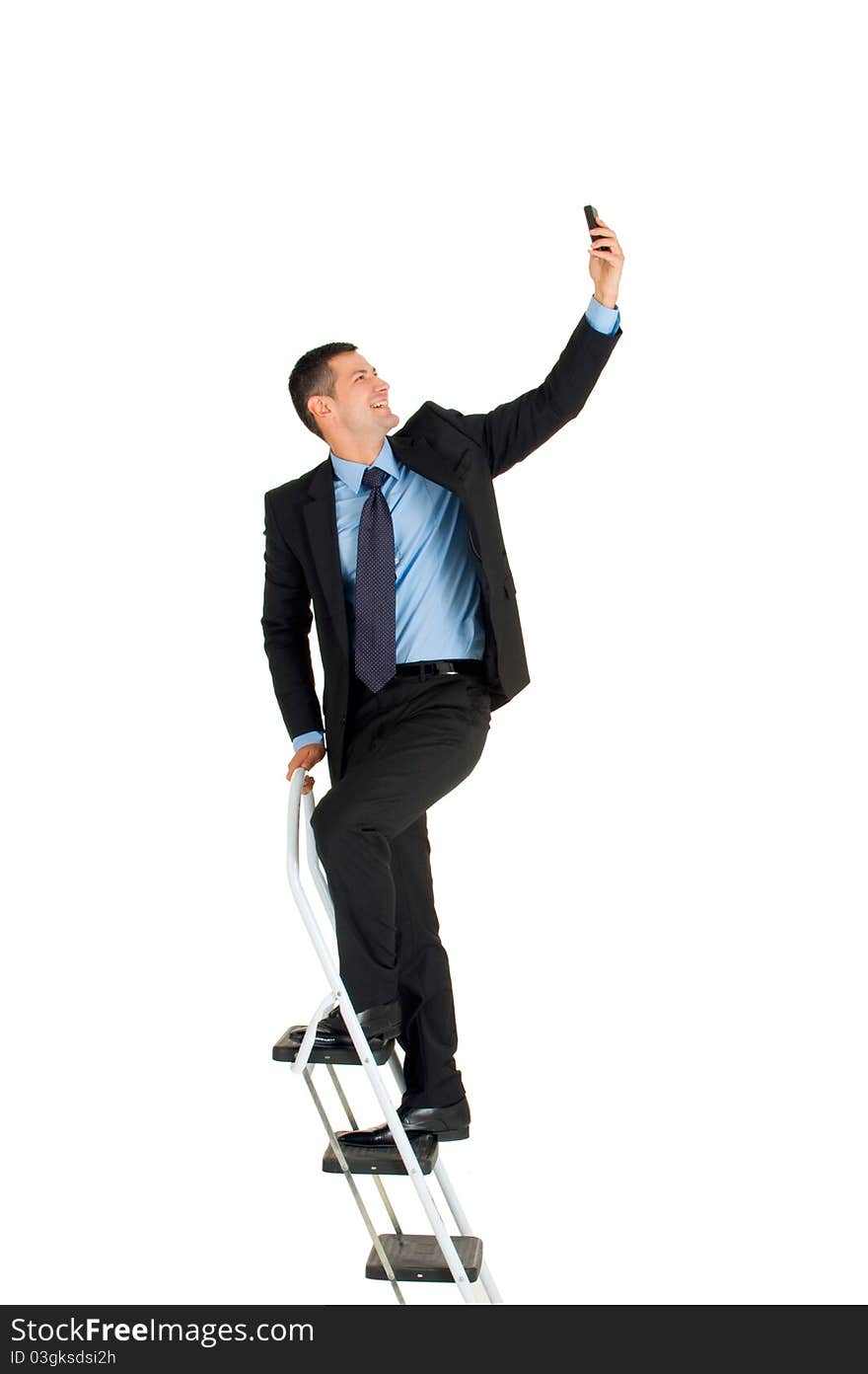 Businessman on a ladder in white background