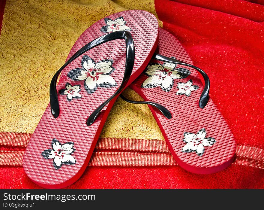 Flipflops on a beach towel