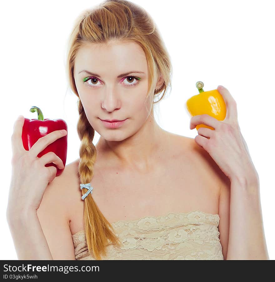 Woman With Yellow And Red Peppers