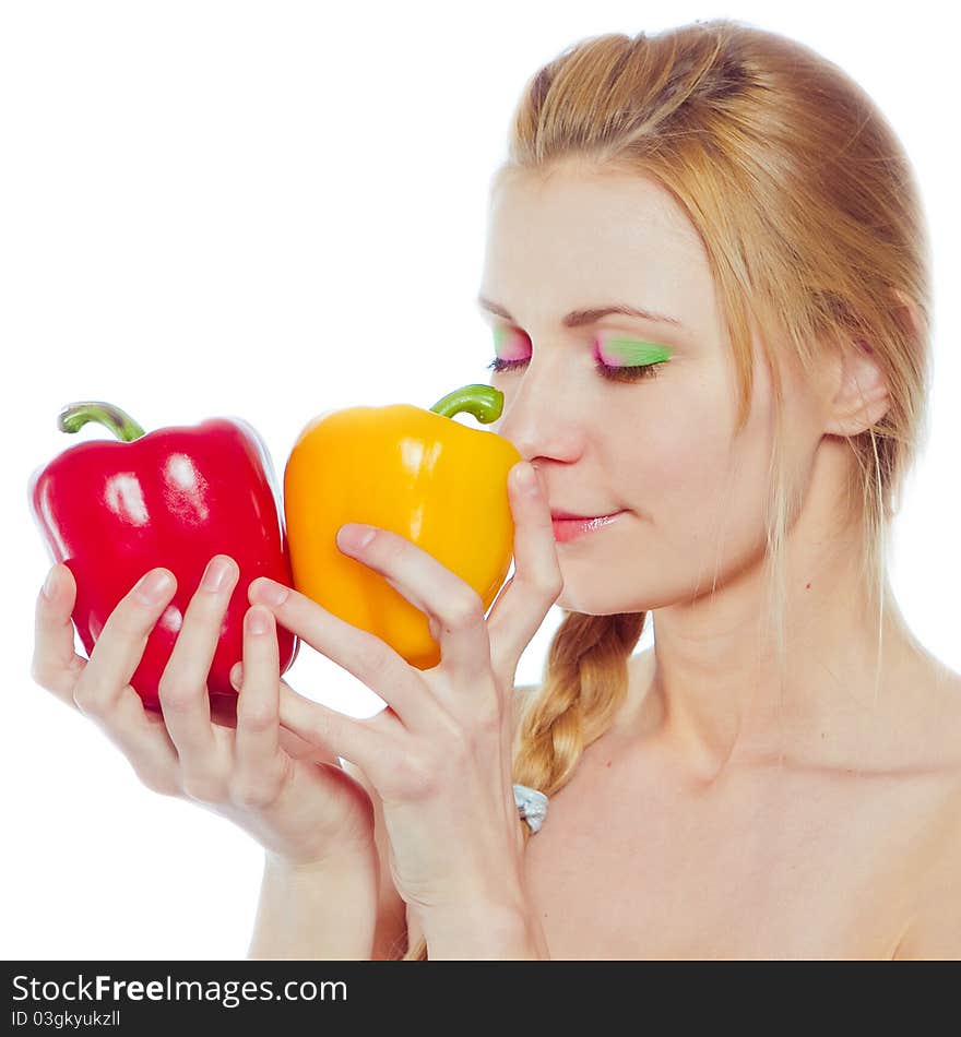 Woman with yellow and red peppers