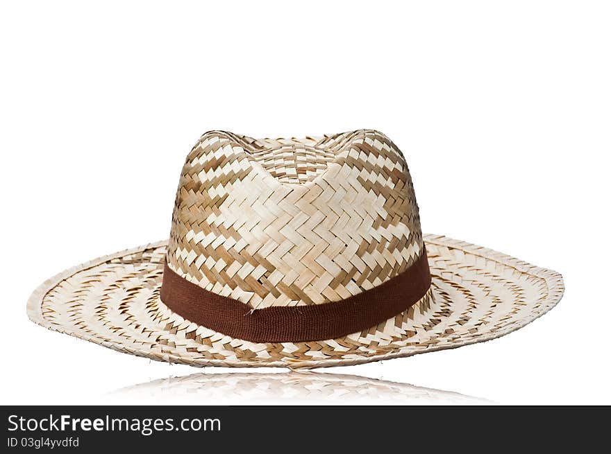 Wicker straw hat  on the background