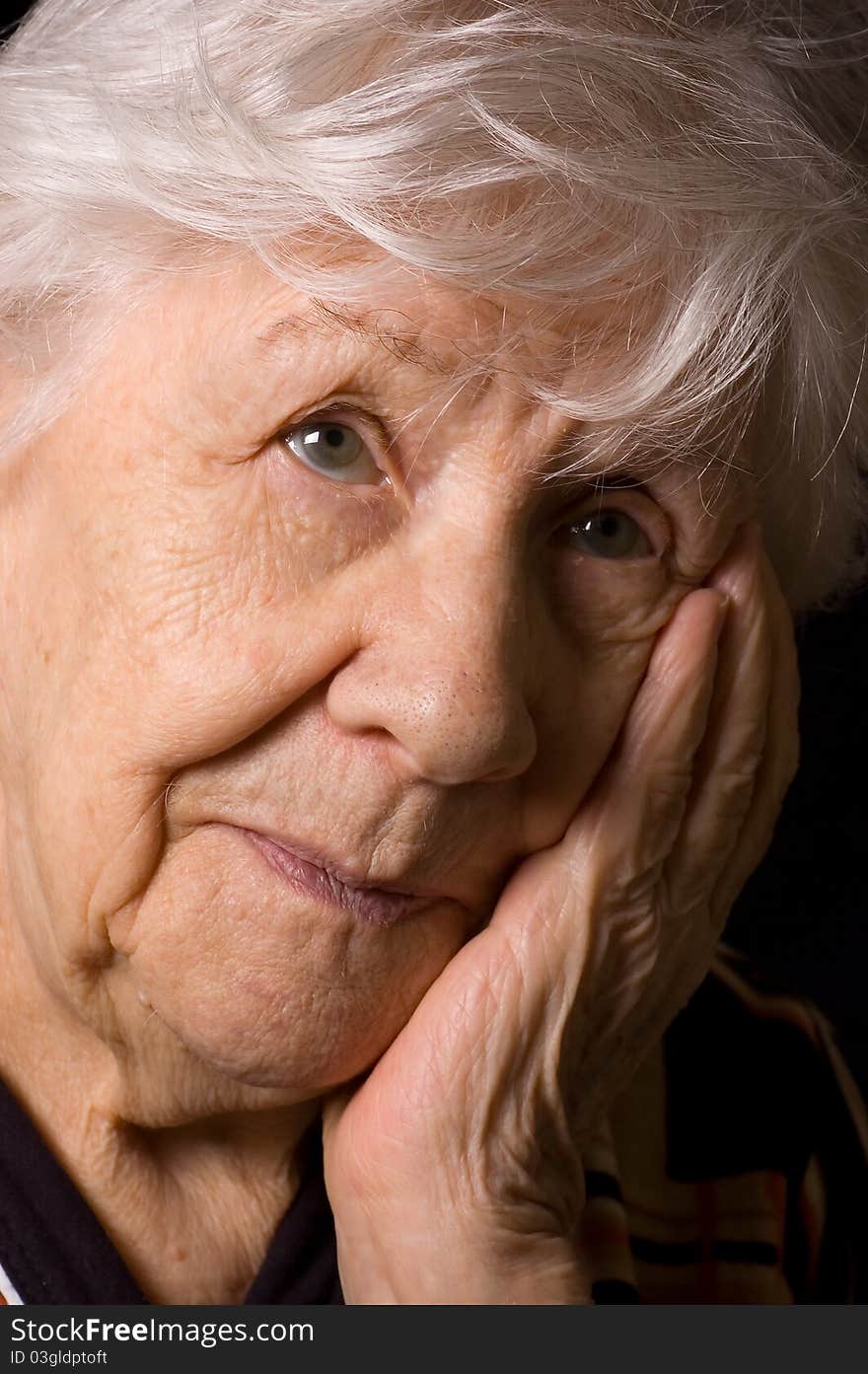 Portrait of the old woman close up