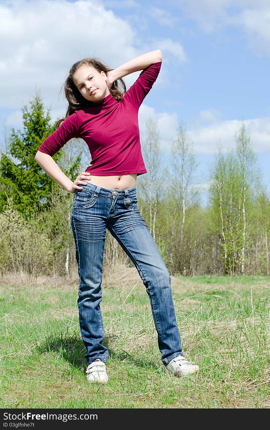 Portrait of the girl against the sky