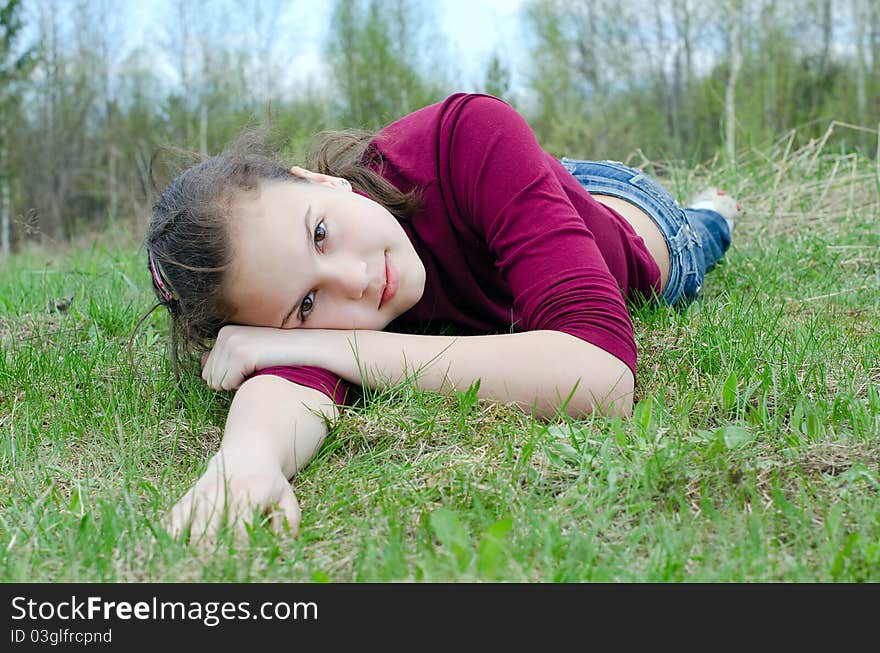 Portrait of the girl against the sky